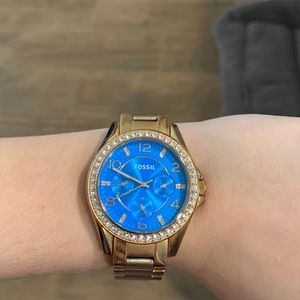 Gold fossil watch
